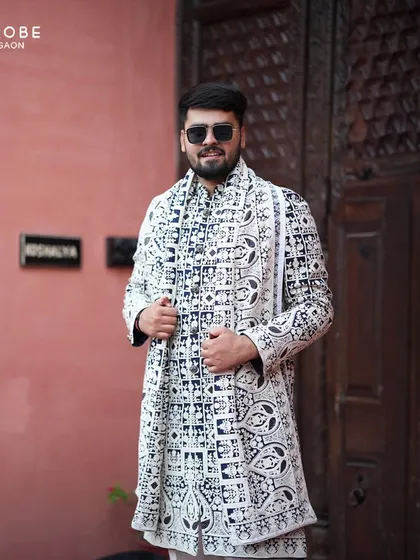 Make a statement at your Sangeet or cocktail party with a modern Indo-western outfit. This black and white embroidered jacket is a perfect example of how I blend traditional craft with contemporary style.
