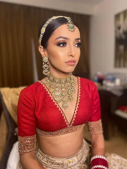 A close-up of Pawlin's high-fashion bridal makeup, focusing on the dramatic eyes and contoured features that define this modern bridal look.