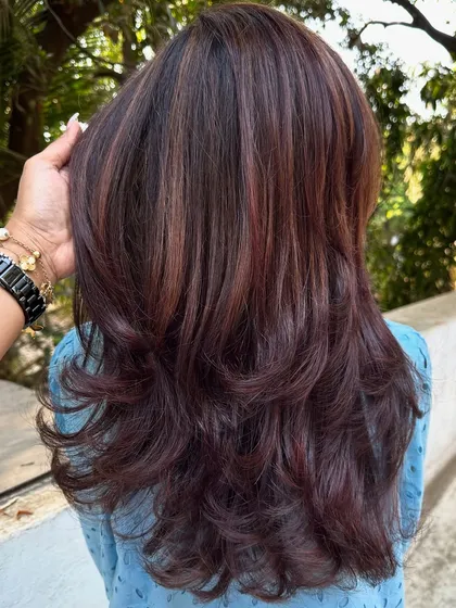 A beautiful blend of 'Mahogany & Plum'. The deep red of the mahogany and the cool tones of the plum create a unique, multi-faceted color that looks different in every light.