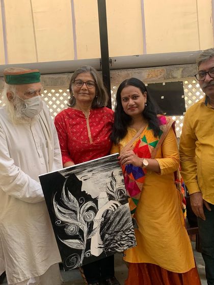 Presenting my black and white portrait at the Speaking Art Foundation event. It was a moving experience to connect with the visually impaired community through art.