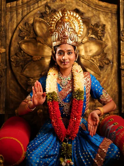 A closer view of the Devi costume, highlighting the detailed jewelry and serene expression. I provide complete styling to help you embody the character.