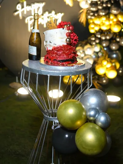 A close-up of the birthday celebration details. I can coordinate every element, including cake stands and decorative accents, to match the overall theme of your party.