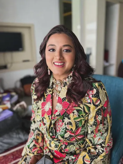 Party glam for a Sangeet night. This look features a bold, floral jacket, so we kept the makeup focused on a classic smokey eye and a glowing complexion.