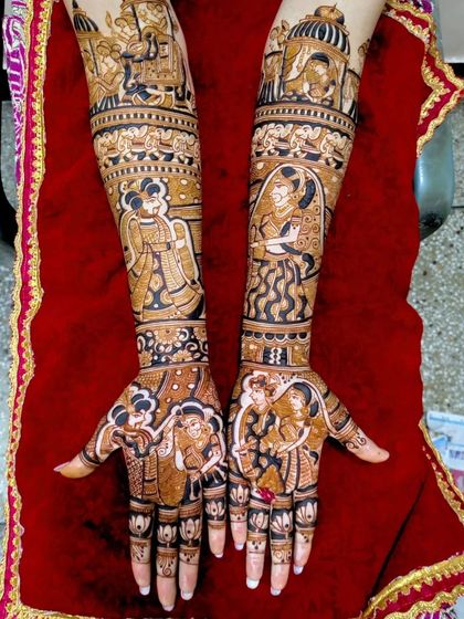 This design shows the couple in different poses on the palms and forearms, capturing various moments of their celebration.