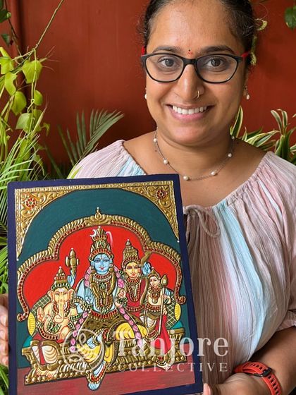 Our student Mrs. Nandini with her beautiful Shiva Parivar painting. Smaller paintings require more patience, and she had it all.