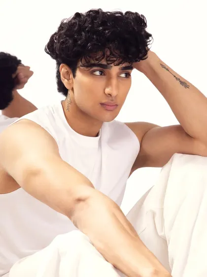 Another close-up, highlighting the defined brows and subtle enhancement that is key to my men's makeup technique.