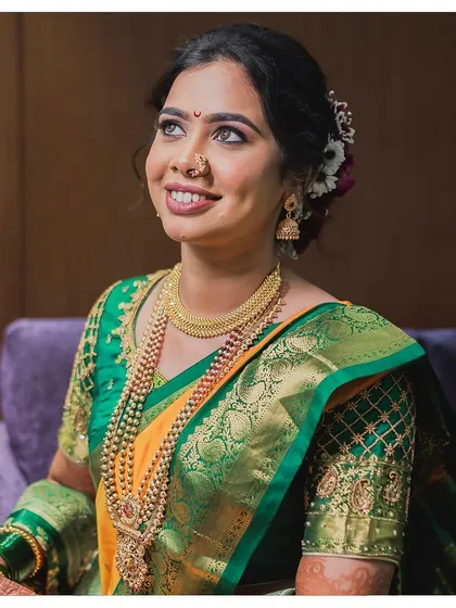 Look at that dimple! Shweta's joy is palpable. Her makeup is soft and radiant, enhancing her natural beauty.