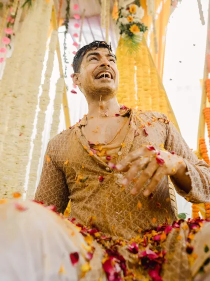 The groom's pure, uninhibited laughter during his Haldi. I believe in capturing these real, unguarded emotions that tell the true story of the day.