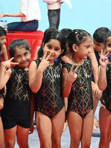 Peace and victory. Our little gymnasts are full of energy and excitement for their training.