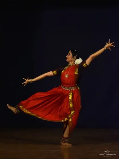 The quintessential posture of Bharatanatyam, embodying both stillness and potential energy. This photograph was taken during a solo performance in Pune, capturing a moment of expansive grace.