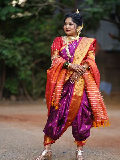 A full view of the majestic Peshwai Nauvari saree. My draping service ensures that this traditional nine-yard saree is styled perfectly for both comfort and elegance.
