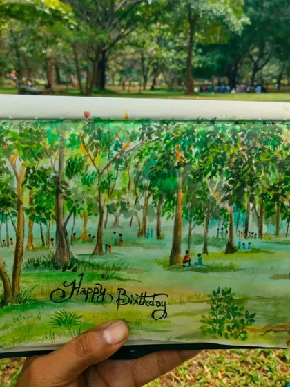 My sketchbook open to a landscape painting done at Cubbon Park. Sometimes a quick sketch is all you need to capture a beautiful moment.