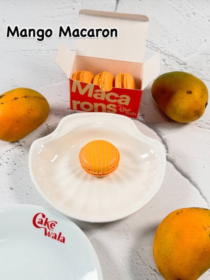 A classic French delicacy gets a tropical twist with our Mango Macarons. These delicate almond cookies are filled with a rich and fruity mango ganache, offering a small bite of intense flavor.