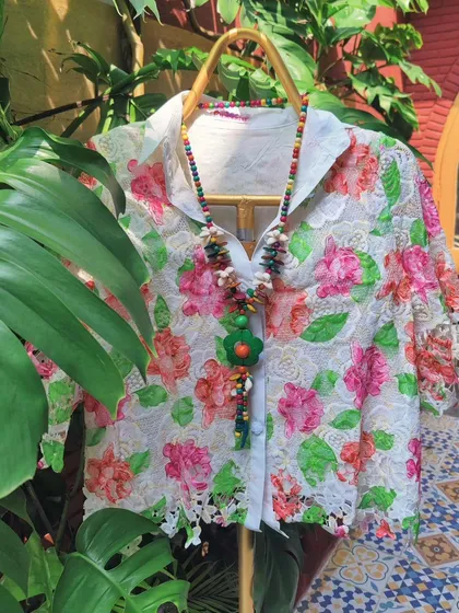 A delicate floral lace shirt from my Autumn collection. This piece is perfect for layering and can be dressed up with a colourful, chunky necklace for a touch of boho-chic style.