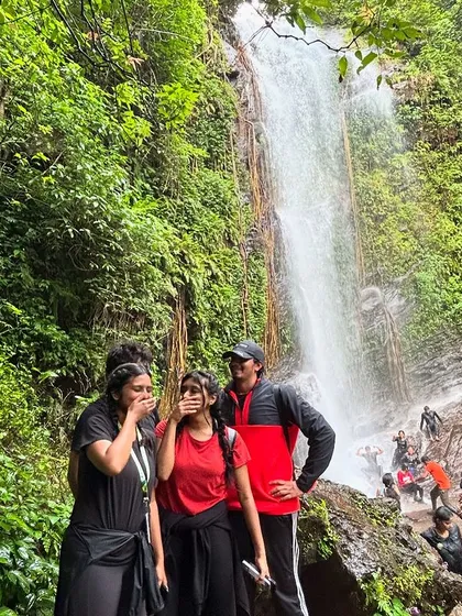 A candid moment at Hidlumane falls, part of our Kodachadri trek. The leeches and the slippery rocks are part of the adventure!