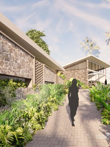 The ramped entrance to the Pai Residence leads to a forecourt that connects three distinct zones: the main residence, a parents' residence, and the garage. The pathway is lined with lush tropical plants and natural stone walls.