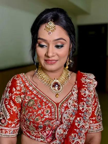 A close-up of the makeup for the Mundan ceremony. The look features a beautiful shimmer on the eyes and a perfectly defined lip.
