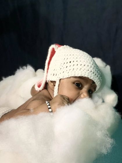 A sweet photo from a client of their newborn in my bunny hat. The simple design with the long ear flap is perfect for capturing that sleepy, angelic baby look.