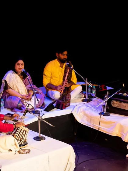 The full ensemble on stage for a vocal concert organized by Debadhara Delhi.