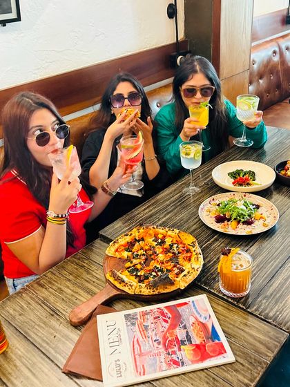 Sipping, eating, and laughing. My restaurant is the perfect spot for a girls' day out.