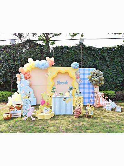 Another full view of our Winnie the Pooh setup, showing all the characters and decorative elements like the beehive and 'hunny' pots, creating a complete themed world.