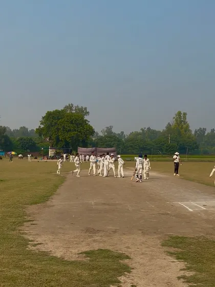 The team celebrating their narrow victory.