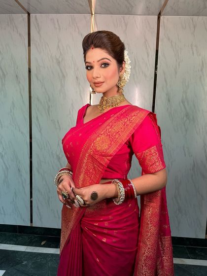 A close-up of the bride, her henna-clad hands and our temple jewellery creating a beautiful picture of tradition.