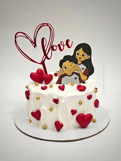 A cute and simple anniversary cake with a "Love" topper and a sweet illustration of a couple.