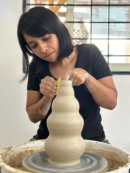It is so satisfying to salvage a piece that was about to be discarded. Here, I am re-centering and reshaping a large pot that a student was struggling with, turning it into a beautiful, curved form.