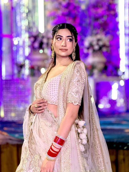 A closer look at the beautiful ivory lehenga we provided for a last-minute request. The delicate embroidery and flattering silhouette made it a perfect choice.