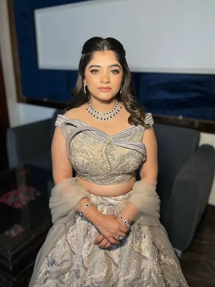 The beautiful Jaya, looking timeless for her engagement. The makeup is glamorous yet soft, with a focus on her eyes.