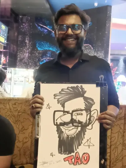 A guest from TAO Architects, a renowned firm in Pune, with his caricature. It's always inspiring to draw for fellow creatives.