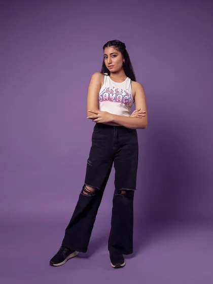 A confident, full-length pose. This shot has a cool, street-style vibe.