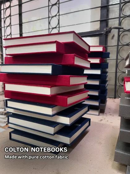 A playful stack of our Colton Notebooks, made with pure cotton fabric covers in rich jewel tones like ruby red and sapphire blue. They feel as good as they look.