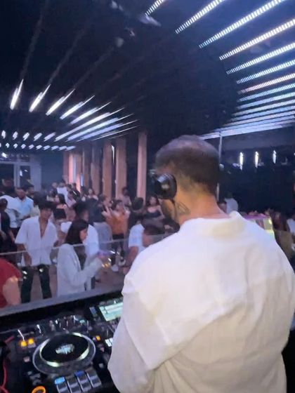 A view from behind, showing my perspective of the packed club. I'm always reading the crowd to decide the next move.