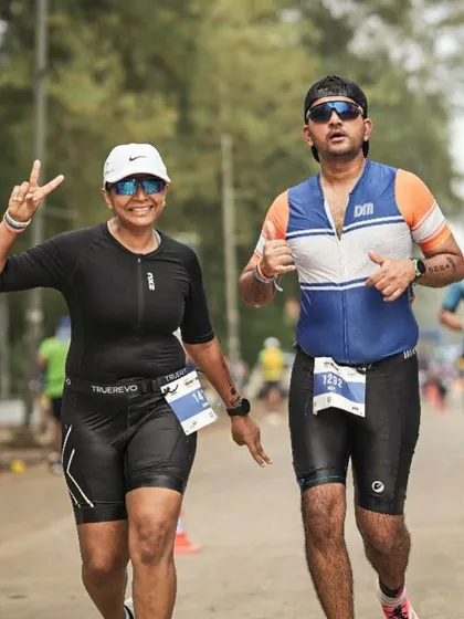 All smiles during the run leg of the Ironman 70.3 Goa. The camaraderie in our team helps push through the toughest moments.