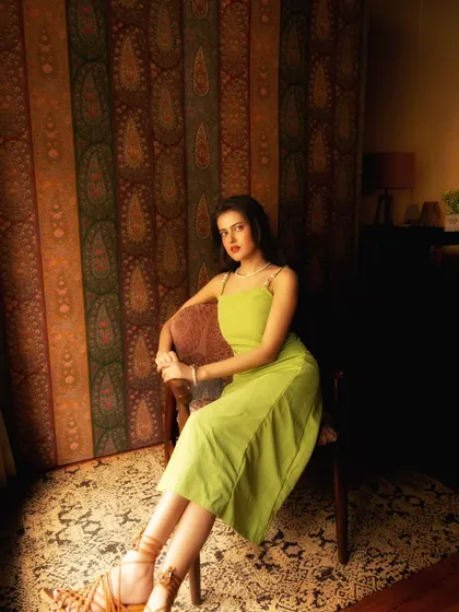 You don't always need a studio. This portrait was taken during a relaxed home shoot, using the natural light and decor to create a warm, atmospheric, and personal image.