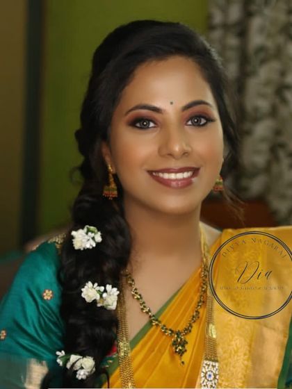 A beautiful smiling portrait of the bride during her Haldi. The natural makeup enhances her features and lets her happiness shine through, which is the most important part of any bridal look.