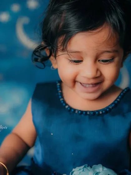 A close-up of that infectious giggle. These are the candid moments that families will treasure forever.