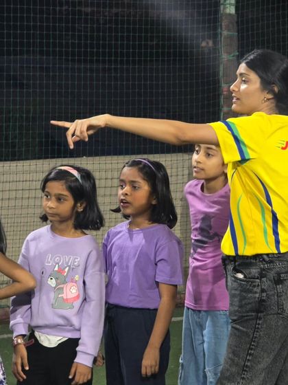 Our coach giving instructions for the next exciting game. We keep the energy high and the kids engaged with clear, fun directions, ensuring everyone knows how to play and stay safe.