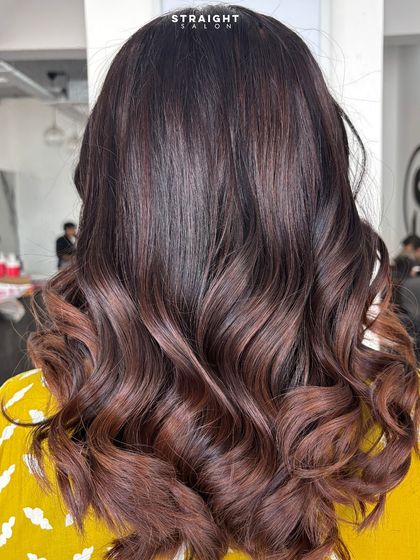 Glossy chocolate tones done right. This hair is guaranteed to turn heads.