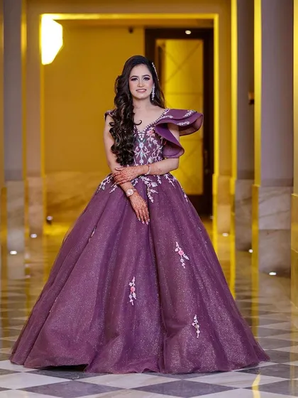 Feeling like a princess for her engagement. This client wanted a grand, fairytale look, and this gorgeous purple ball gown was the perfect match for her glamorous makeup.