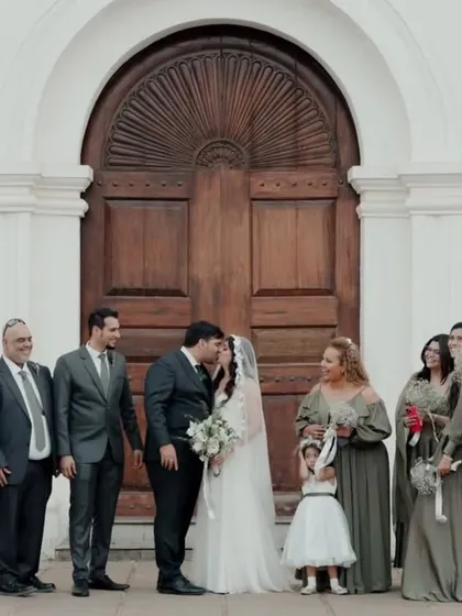 A collection of memories from a beautiful Catholic wedding in Goa. The bride's hair is styled in soft waves under her veil, and her makeup is natural and glowing, capturing her joyful and candid moments perfectly.