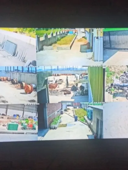 This monitor displays feeds from an outdoor system, covering a large yard, parking area, and building entrances. We ensure your system provides a complete view of your property's exterior.