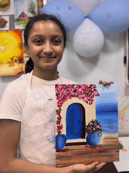 Another happy student from our Valentine's week workshop. Her canvas painting captures the bright, sunny feel of a seaside escape, showcasing her impressive skills.