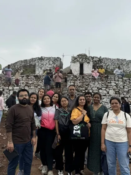 Our group exploring the ancient stone structures at Baba Budangiri, a key site in our Chikmagalur itinerary that blends trekking with history.