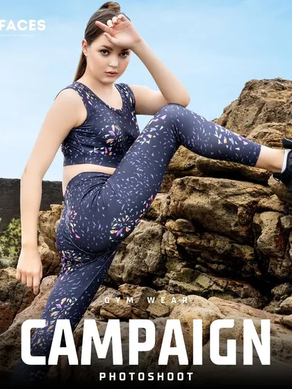 A model in printed leggings and a sports bra strikes an athletic pose on a rocky outdoor terrain. We use natural landscapes to create a rugged and adventurous backdrop for sportswear and lifestyle brands.