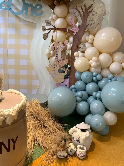 Another view of the beautiful balloon work and custom cutouts that brought the Hundred Acre Wood to life.