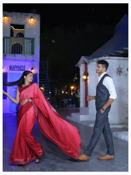 A beautiful night shot on our European-style street set, with the flowing saree adding a touch of Bollywood-style romance.