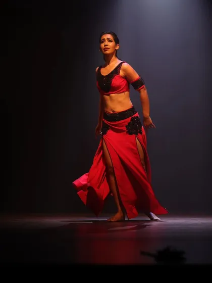 A dynamic solo performance still, reflecting the hard work and preparation for our showcases.